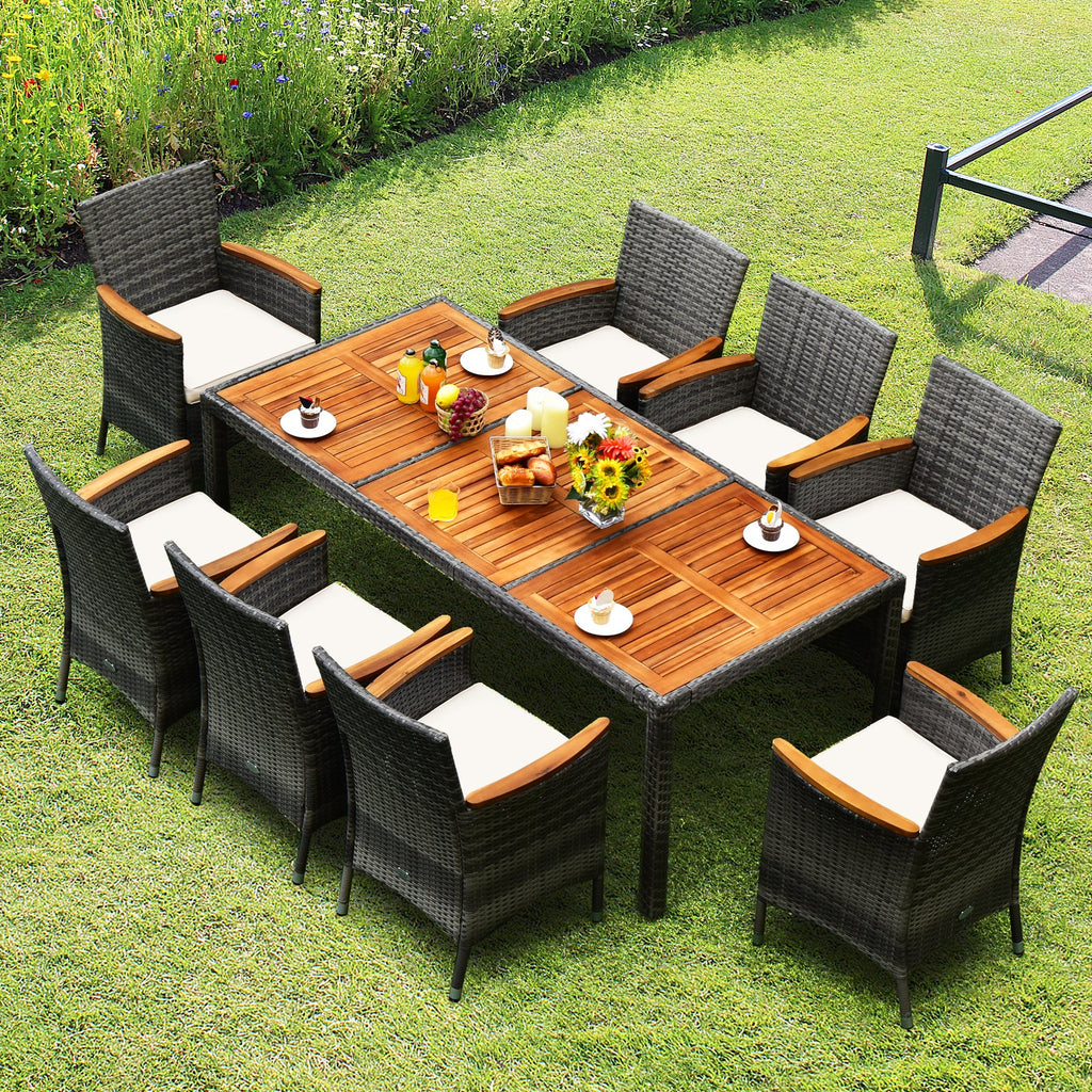 9-Piece Rattan Patio Dining Set with Acacia Wood Table and Cushioned Chair