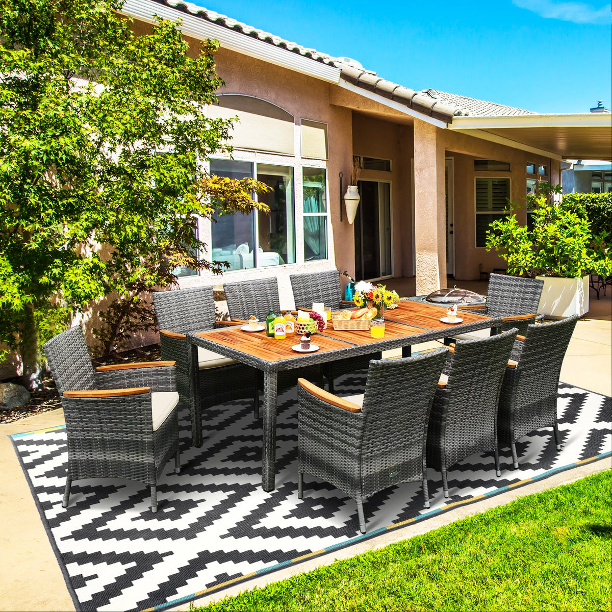 9-Piece Rattan Patio Dining Set with Acacia Wood Table and Cushioned Chair